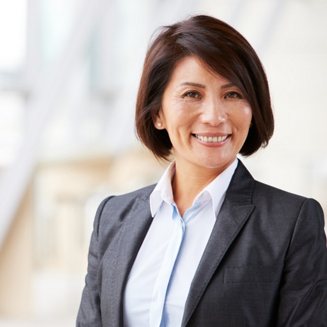 Woman in business suit.